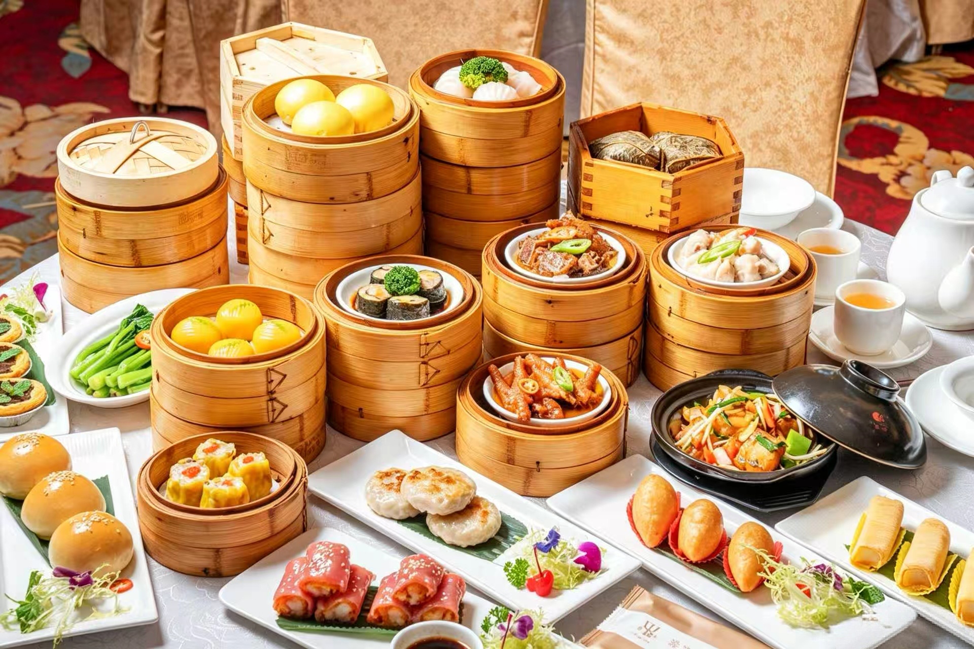 Bamboo steamers of har gow, siu mai, and char siu bao at a traditional Hong Kong dim sum restaurant