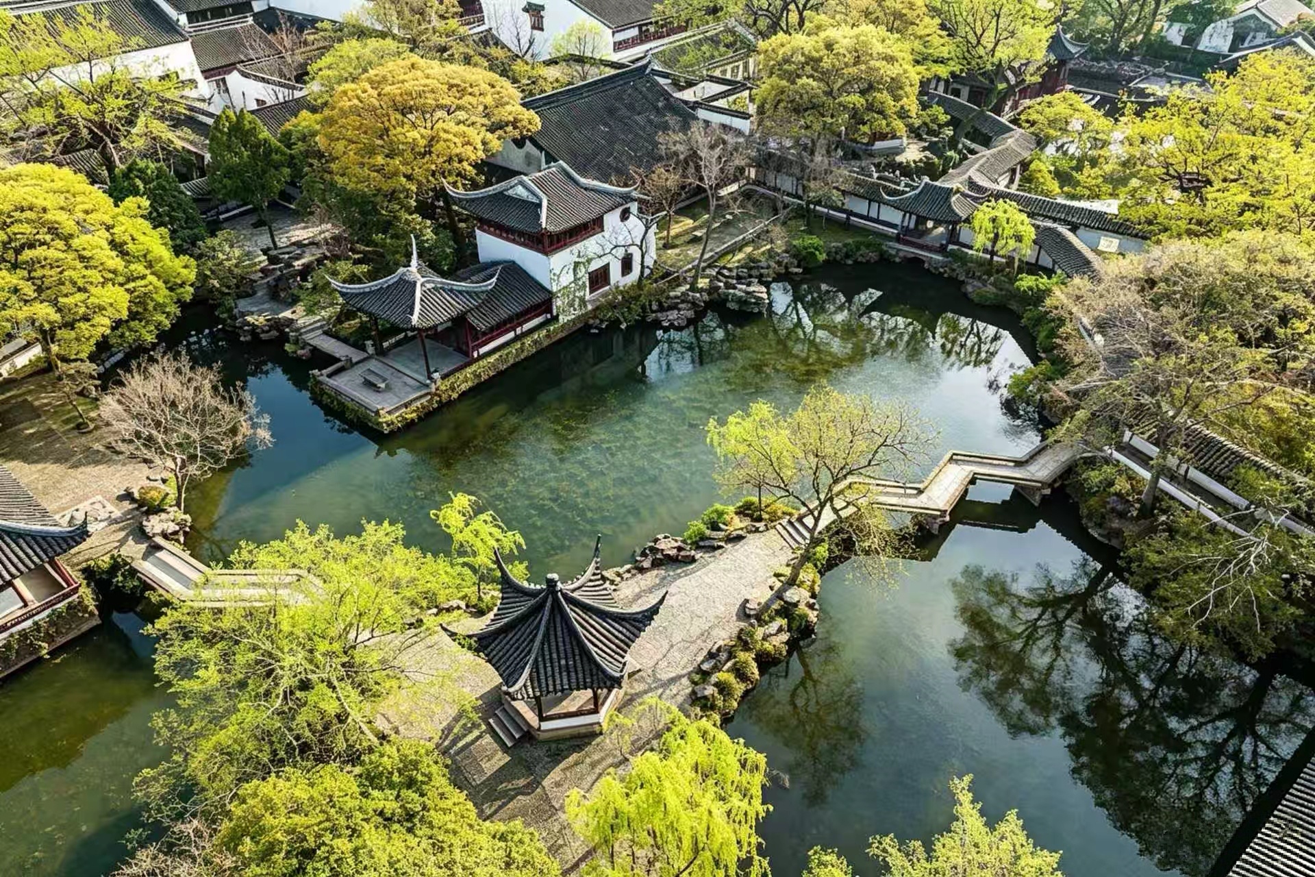 The Humble Administrator's Garden — pavilions reflected in a lotus pond, the essence of Ming Dynasty garden design